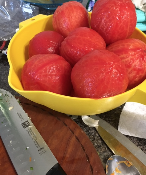 Whole tomatoes with skin removed