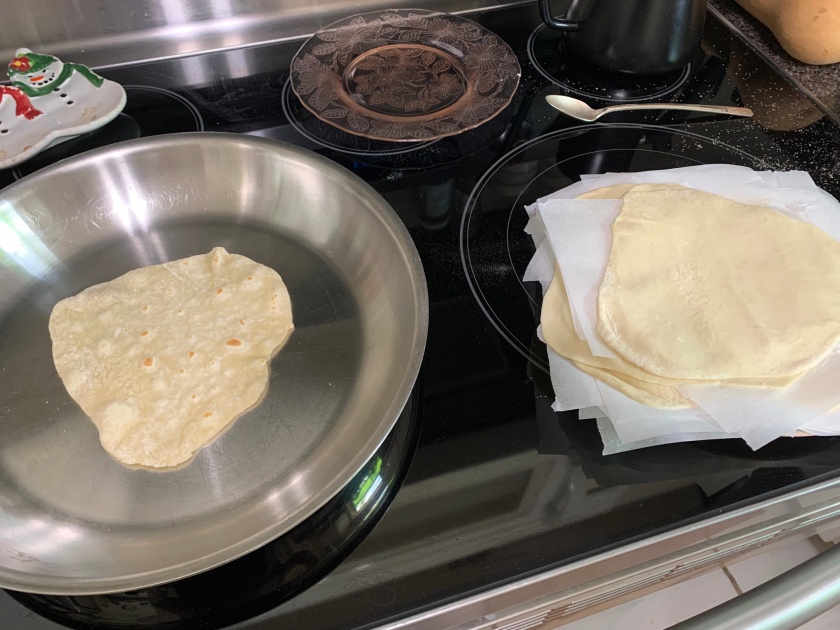 cooking homemade tortillas
