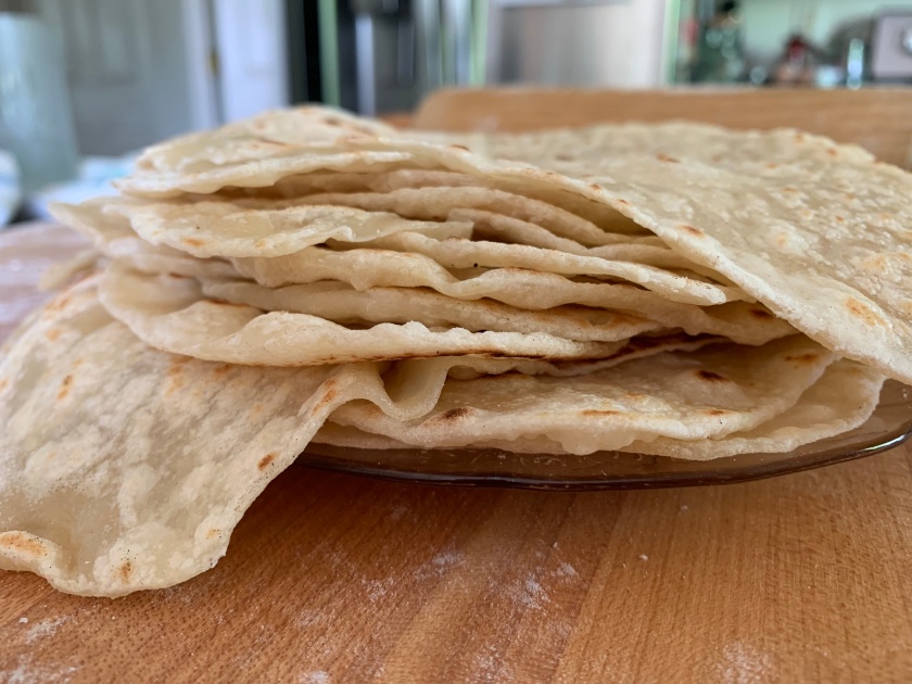 pile of tortillas stacked on a plate